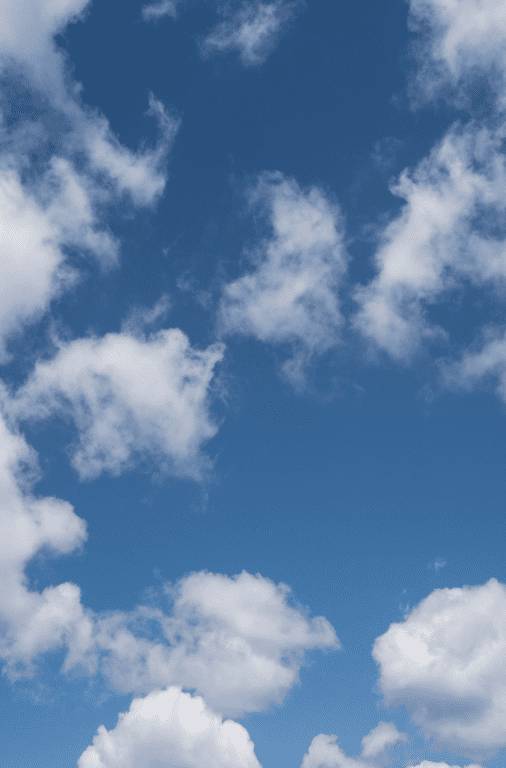 White clouds against a blue sky