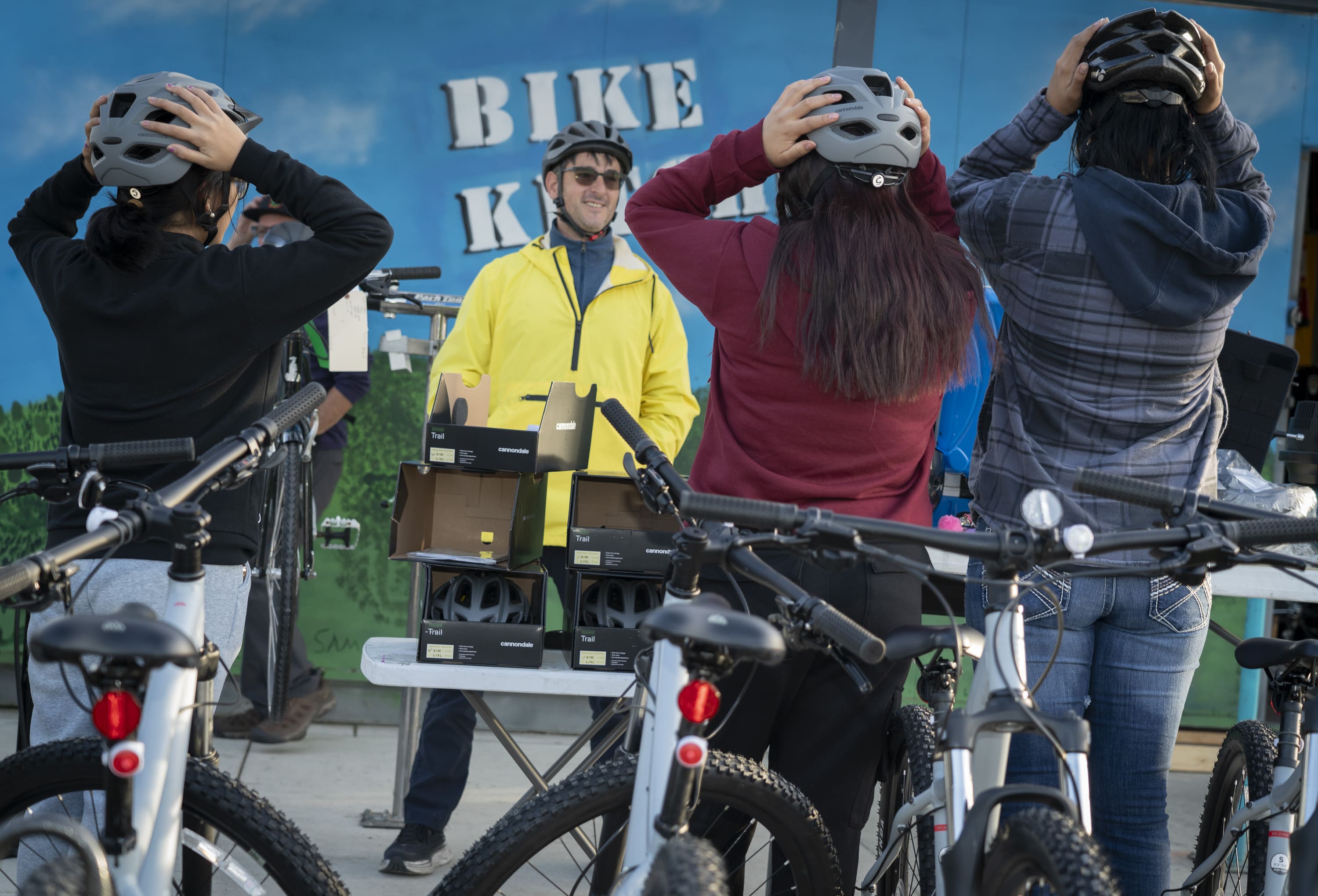 Group of cyclists wearing helmets