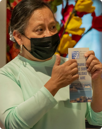 Woman explaining details on brochure