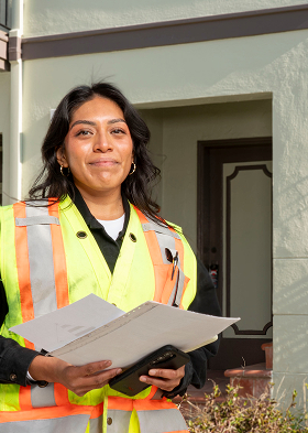 Woman wearing construction uniform